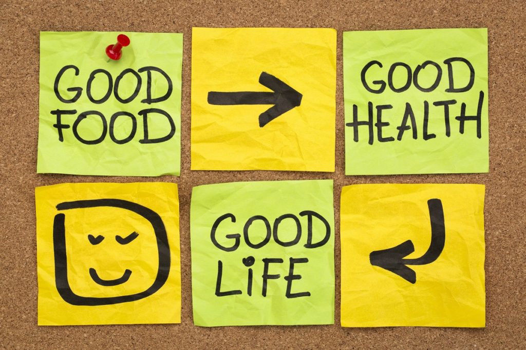 healthy lifestyle concept - good food, health and life - reminder words handwritten of sticky notes